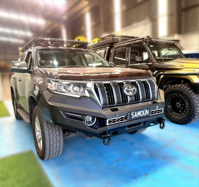 Toyota Prado 150 with black powder-coated RoadMaster bullbar featuring winch compatibility and aggressive off-road styling