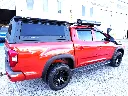 ARMORMAN4X4-SOLID SIDE- GLASS CANOPY-LDV.webp
