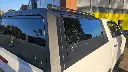 Solid-side-glass-tub-Canopy-for-Hilux-ARMORMAN-4X4-1.webp