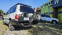 BUSHMASTER REAR CARRIER BAR- LC100