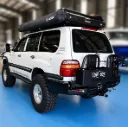 BUSHMASTER REAR CARRIER BAR- LC100