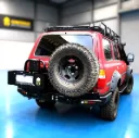 BUSHMASTR REAR CARRIR BAR-LC80